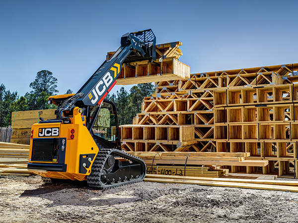 JCB teleskid stacking wood