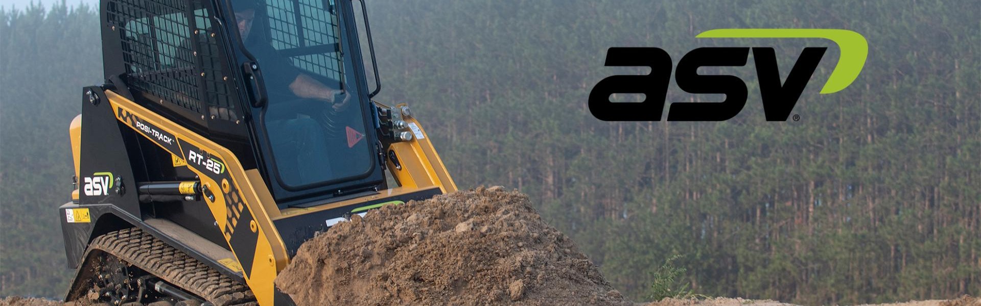 ASV compact truck loader moving earth