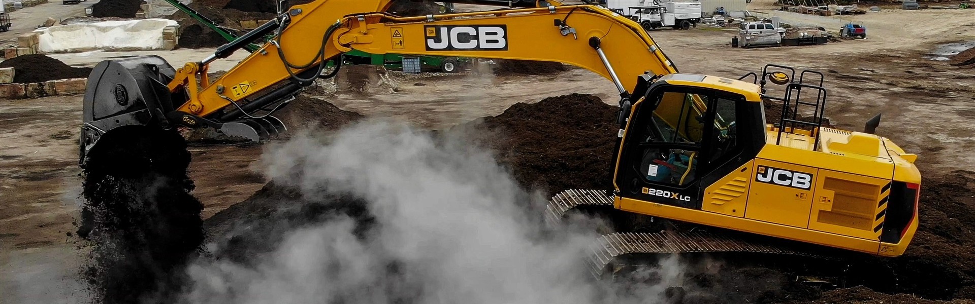 JCB excavator moving earth